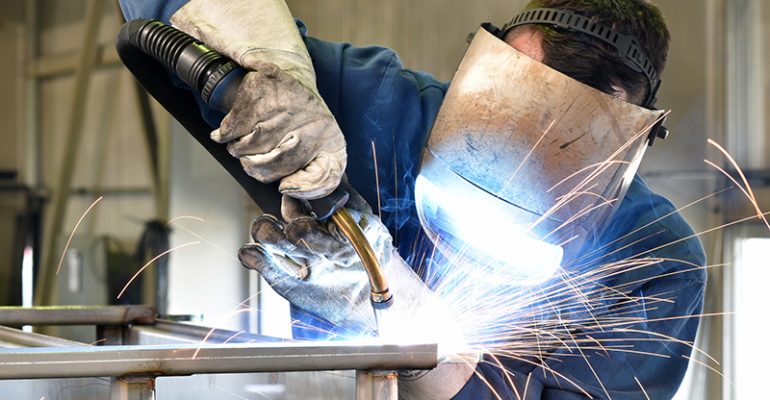 welder works in metal construction - construction and processing welder works in metal construction - construction and processing of steel components